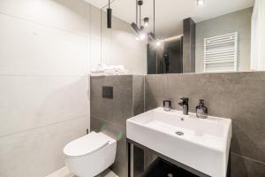 Kúpeľňa v ubytovaní Nadmorski Loft GREEN PORT SPA - 750 m od plaży