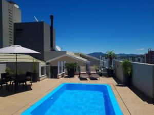 Kolam renang di atau dekat dengan Campinas Penthouse - Cobertura Luxo com Piscina Privativa