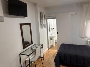 Posteľ alebo postele v izbe v ubytovaní Hostal ARS