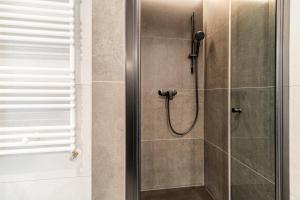 Kúpeľňa v ubytovaní Nadmorski Loft GREEN PORT SPA - 750 m od plaży