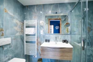 Ванная комната в Suites Coronell d'En Vila