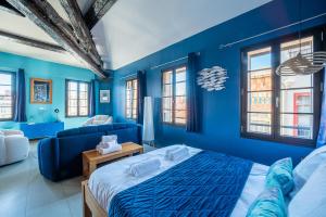 Кровать или кровати в номере Suites Coronell d'En Vila
