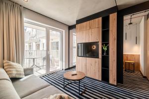 Televízia a/alebo spoločenská miestnosť v ubytovaní Nadmorski Loft GREEN PORT SPA - 750 m od plaży