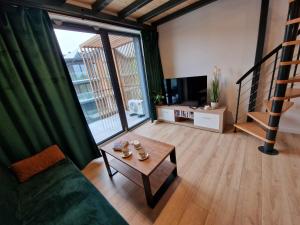 Ruang duduk di Apartament Zielony 36 Laguna Beskidów "prywatna komórka"
