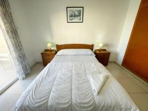 Postel nebo postele na pokoji v ubytování Apartamentos Azahar 3000 + 37 fotografií