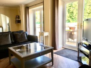 A seating area at Stay at The lodge set in the grounds of a beautiful Manor House