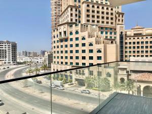 a view of a city street with tall buildings at LUXURY 2 BR APARTMENT IN JADDAF By 0 10 AQUA in Dubai