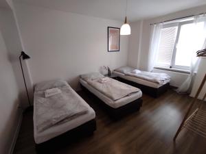 A bed or beds in a room at Symple apartments