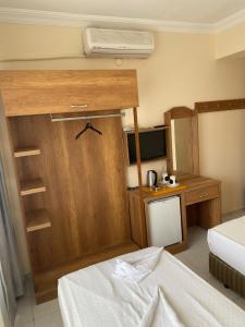 Postel nebo postele na pokoji v ubytování Dilhan Hotel