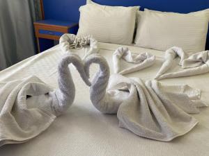 Postel nebo postele na pokoji v ubytování Dilhan Hotel