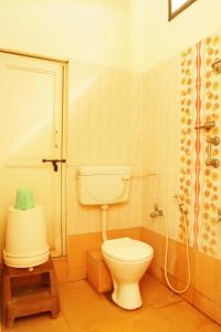 Koupelna v ubytování KG Grand Inn + 37 fotografií