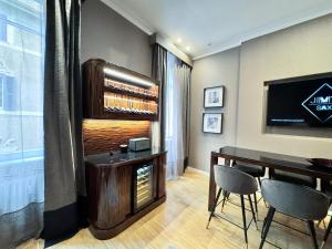 Una televisión o centro de entretenimiento en Easydomus Rome