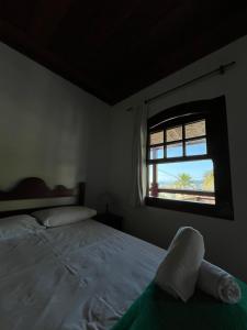 Postel nebo postele na pokoji v ubytování Pousada Brisamar Paraty COMECE O DIA COM UM CAFÉ DA MANHÃ INESQUECÍVEL