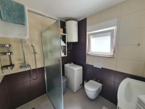 Kúpeľňa v ubytovaní Modern apartment near the sea-Miše + 37 fotografií