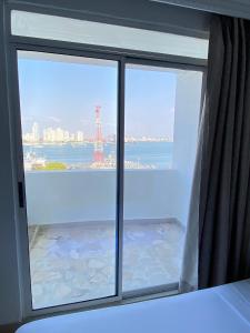 Postel nebo postele na pokoji v ubytování Hotel Cartagena Premium