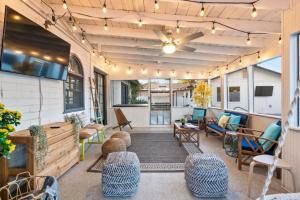 an outdoor patio with furniture and a ceiling at Oak Scottsdale - BOHO Scottsdale Oasis Getaway-Pool-Hottub-ZenRoom in Scottsdale