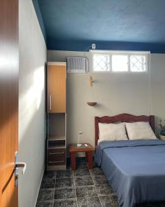 Cama ou camas em um quarto em A Casa Azul