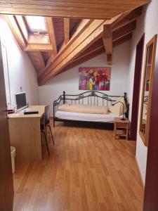 Postel nebo postele na pokoji v ubytování Hotel Alpha Thun