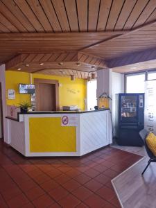 Kuchyň nebo kuchyňský kout v ubytování Hotel Alpha Thun