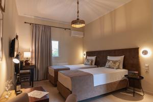 A bed or beds in a room at STUDIO SPYROS