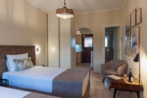 A bed or beds in a room at STUDIO SPYROS
