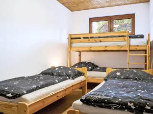 Postel nebo postele na pokoji v ubytování Apartment Pod Černou Studnicí-3 by Interhome