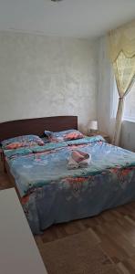 Кровать или кровати в номере Casa de vacanță MARA emd
