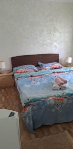 Кровать или кровати в номере Casa de vacanță MARA emd