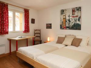 Katil atau katil-katil dalam bilik di Apartment Les Combins apt- 23 by Interhome