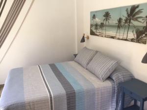 Postel nebo postele na pokoji v ubytování Apartamentos Brisamar a 50 metros de la playa