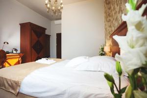 Posteľ alebo postele v izbe v ubytovaní Hotel Akvilon