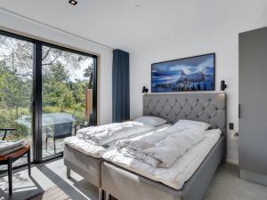 Voodi või voodid majutusasutuse Holiday Home Stellan - 1-4km from the sea by Interhome toas