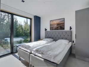 Voodi või voodid majutusasutuse Holiday Home Stellan - 1-4km from the sea by Interhome toas