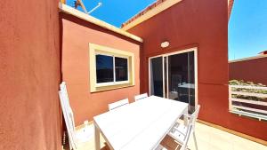 A balcony or terrace at Home FTV, by Comfortable Luxury