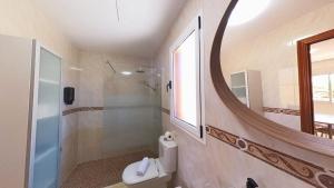 A bathroom at Home FTV, by Comfortable Luxury