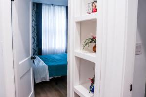 Lova arba lovos apgyvendinimo įstaigoje Downtown Retreat - 2BR Oasis