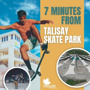 タリサイにあるMMaple Residences Talisayのスケートボードのトリックをやっている男