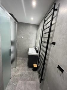 a bathroom with a sink and a shower at Apartment Martin in Sonnenalpe Nassfeld