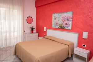 Postel nebo postele na pokoji v ubytování Hotel Baia Verde