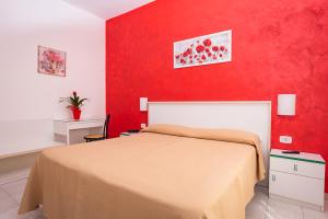 Postel nebo postele na pokoji v ubytování Hotel Baia Verde