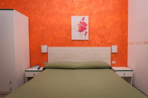Postel nebo postele na pokoji v ubytování Hotel Baia Verde
