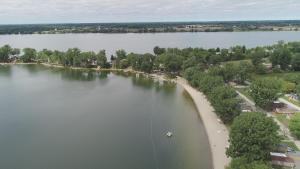 an aerial view of a large lake with a beach at 3 Bedroom Cottage Beachview Lane 35 in Cherry Valley +2 photos