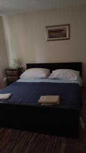 Łóżko lub łóżka w pokoju w obiekcie Apartment Lavinia
