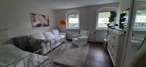 Ruang duduk di Ferienwohnung An der Fangschleuse