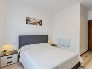 Ένα ή περισσότερα κρεβάτια σε δωμάτιο στο Apartment Daniela by Interhome