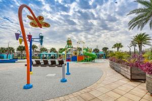 a playground at a park with a slide at Near Disney and Legoland Spacious Poolside Oasis! in Haines City
