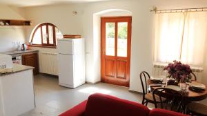 Kuchyň nebo kuchyňský kout v ubytování Casa Cocola