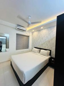 Krevet ili kreveti u jedinici u okviru objekta HOTEL NUJOOM Rooms & Apartments