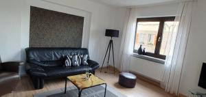Posezení v ubytování Ferienwohnung An der Dorfmauer