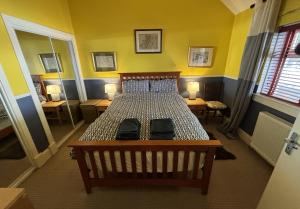 Postel nebo postele na pokoji v ubytování North Lodge Kilmun